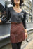 Picture of brick red geometric mini skirt