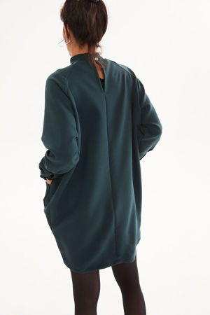 Picture of oversized single pocket dress in green teal