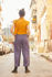 Picture of pleated pocket pants in purple