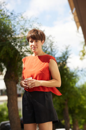Picture of back slit top in orange red