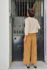 Picture of high waist corduroy pants in ochre