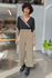 Picture of "flying lapel" jumpsuit in olive black