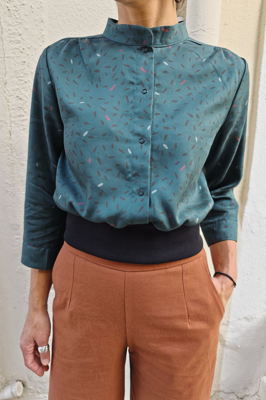 Picture of bomber shirt in teal strokes