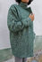 Picture of the "cocoon" coat in green herringbone