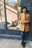 Picture of "curves" coat in pale mustard