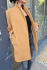 Picture of "curves" coat in pale mustard