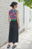 Picture of vest jumpsuit in black - purple floral