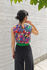 Picture of vest jumpsuit in black - purple floral