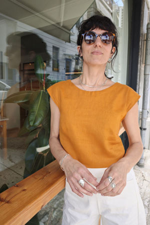 Picture of open back crop top in burnt orange