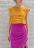 Picture of open back crop top in burnt orange